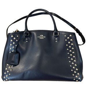 COACH Navy Blue w/Brass Studs Preowned. 14”x10”x6.5”  +42” adjust shoulder strap